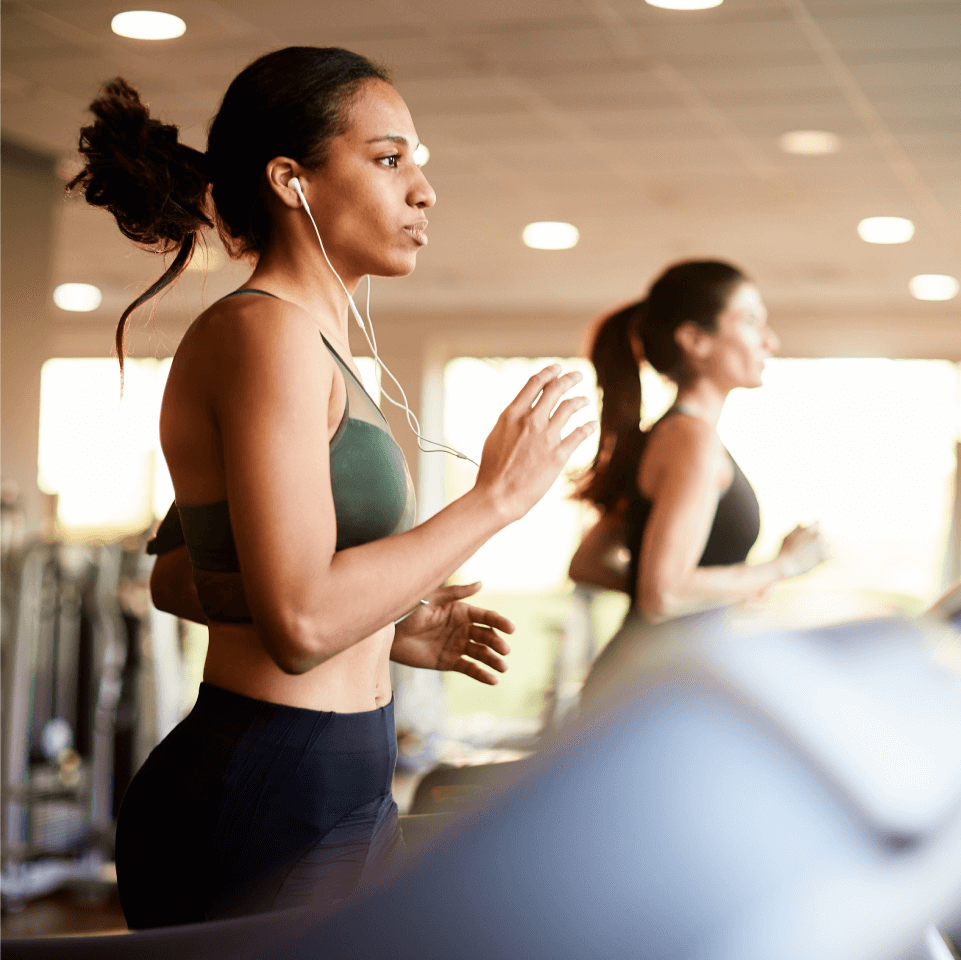 Women running on treadmill